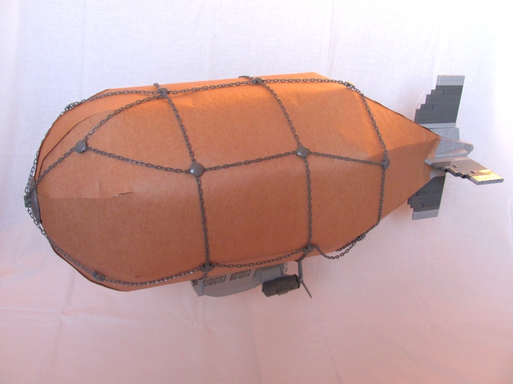 LEGO MOC - Mini-contest 'Zeppelin Battle' - Postman (Dirigible): Let's get chains all over & load the mail!<br />
