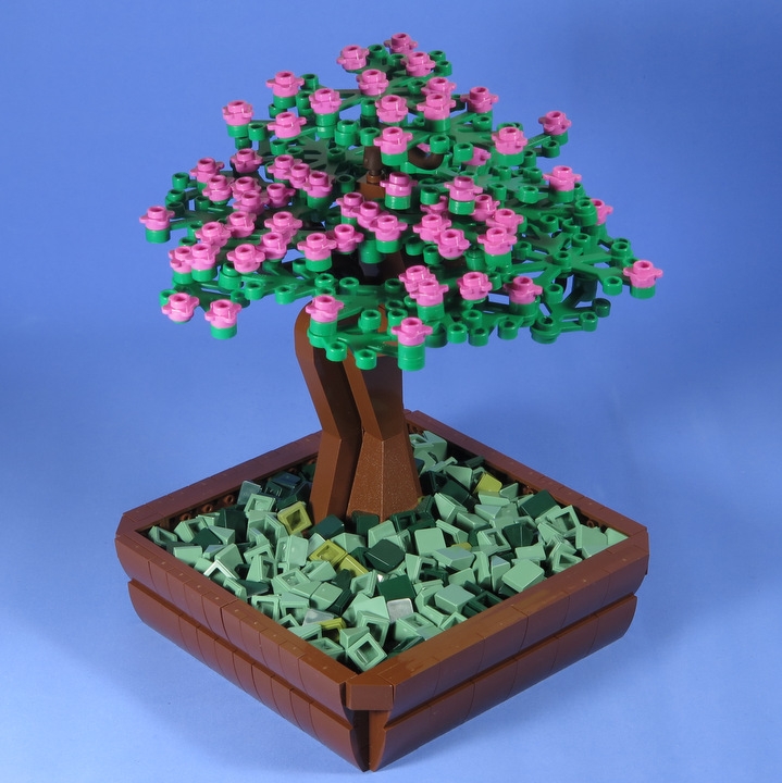 LEGO MOC - 16x16: Botany - Цветущая Сакура (бонсай): Са́кура(яп. 桜 или яп. 櫻) — название нескольких деревьев подсемейства Сливовые; зачастую обозначает вишню мелкопильчатую. Многие виды, называемые «сакурой», используются в культуре только как декоративные растения и либо не плодоносят вообще, либо дают мелкий и несъедобный плод.